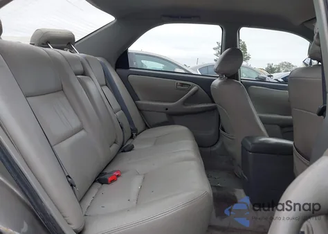 2001 Toyota Camry Le z USA, uszkodzony, nr VIN 4T1BG22K01U109580